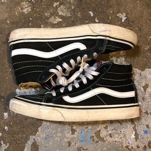 Vans Black and White High-Top Sneakers